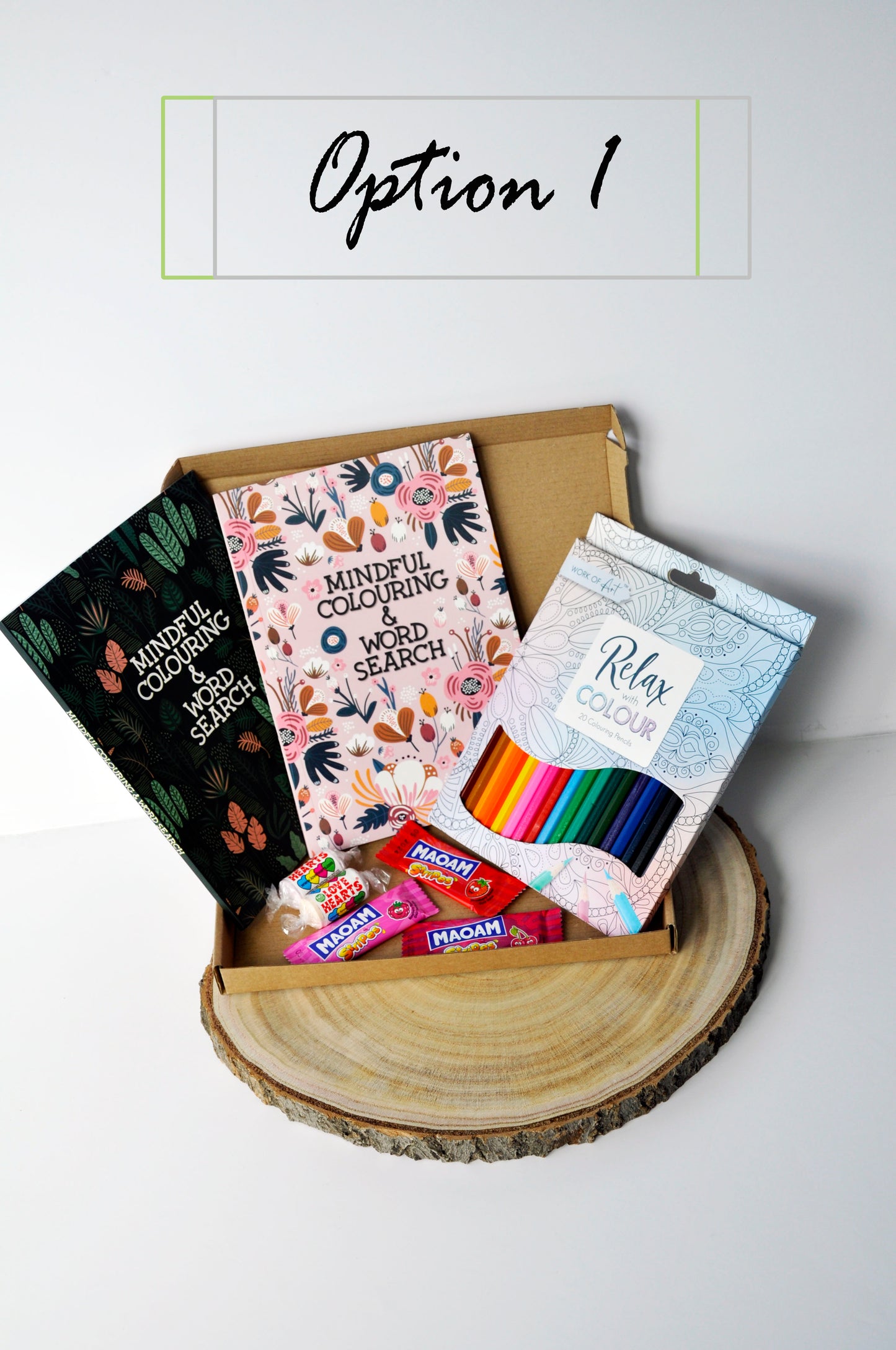 2 mindful colouring and word search books with 2 love heart sweets, a set of 20 pencils and 3 maoam sweets