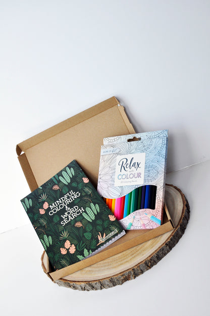 medium letterbox box showing 1 mindful colouring and word search book in green and 1 set of 20 colouring pencils